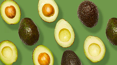Assorted whole and halved avocados