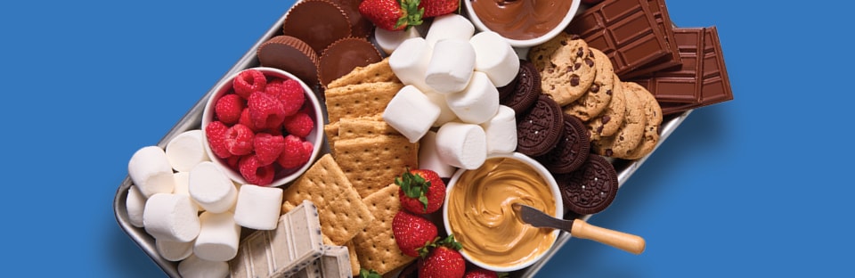 Platter with assorted sweets for a s’mores station
