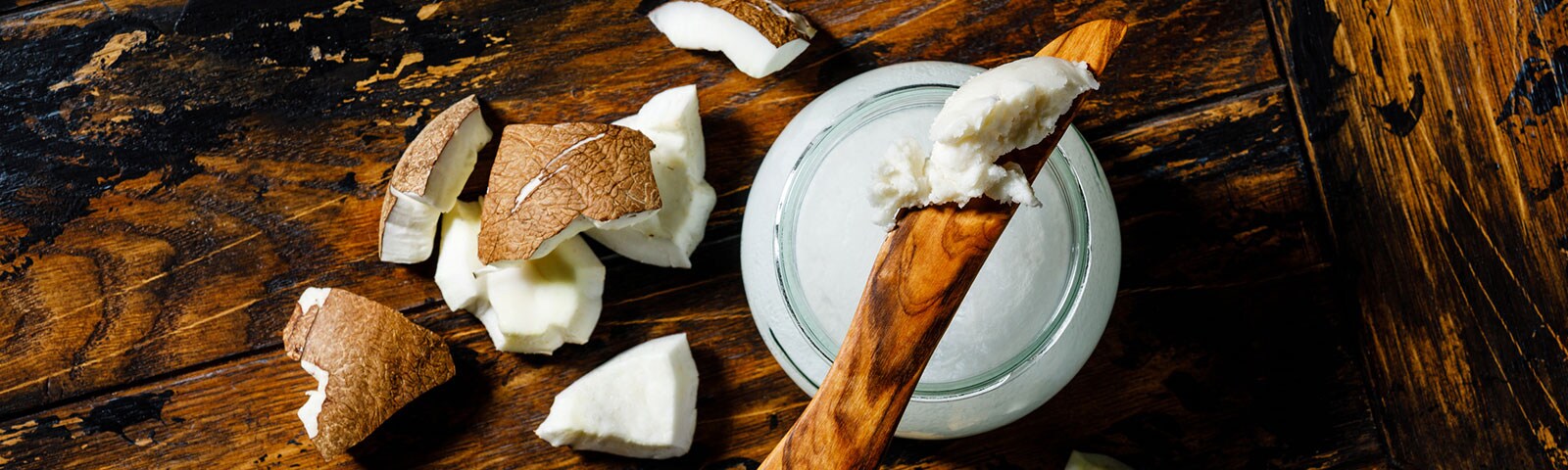 Coconut oil on a wooden table
