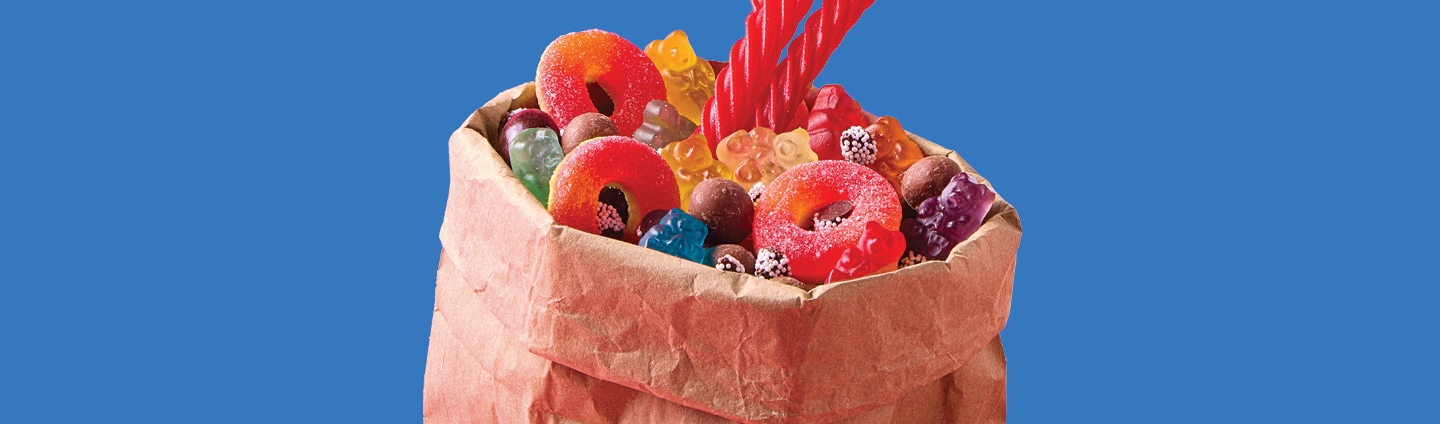 Paper bag with assorted sweets and candies